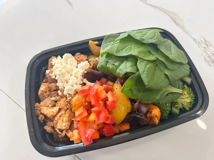Prepared food bowl with fresh vegetables